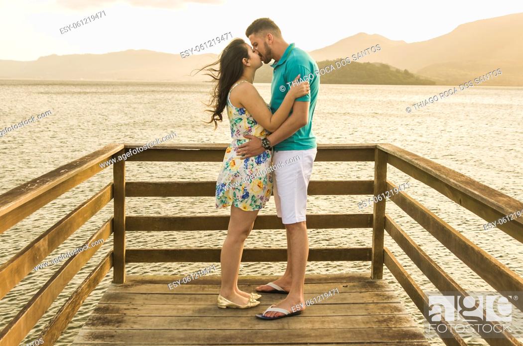 Stock Photo: Pre wedding couple and amazing landscape in Torres beach.