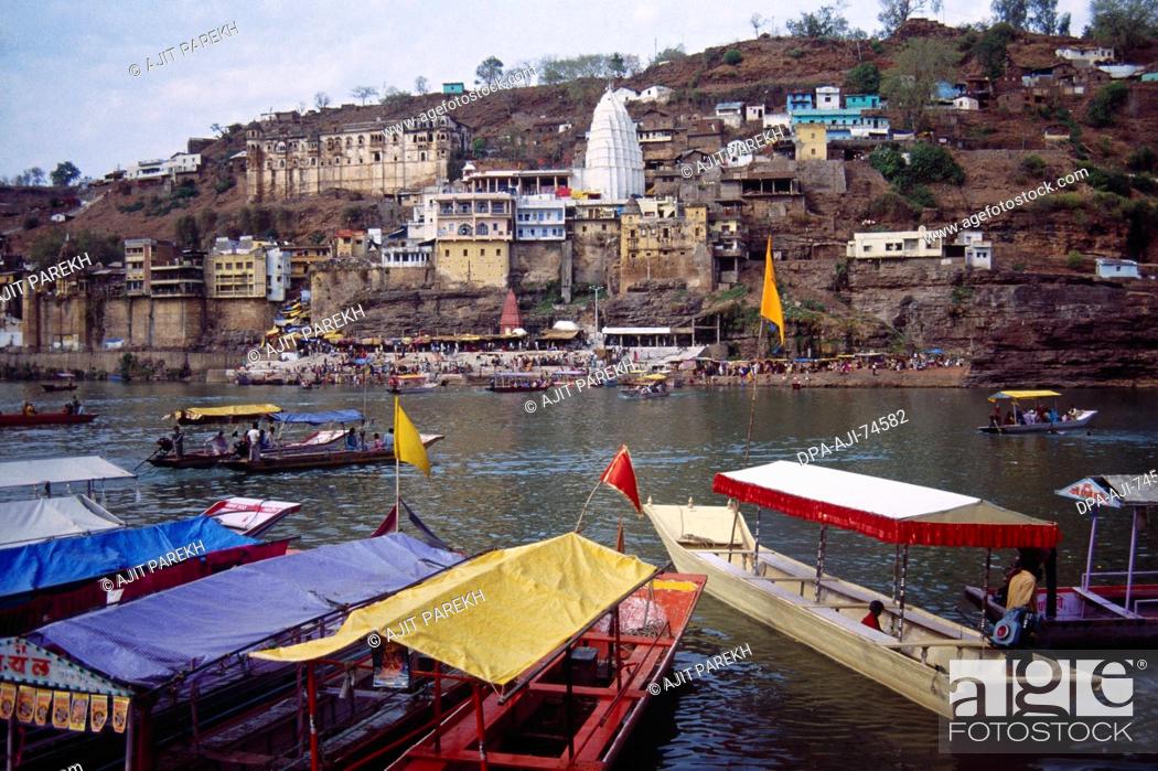Stock Photo: Narmada river and boats - Omkareshwar , Madhya Pradesh , India.