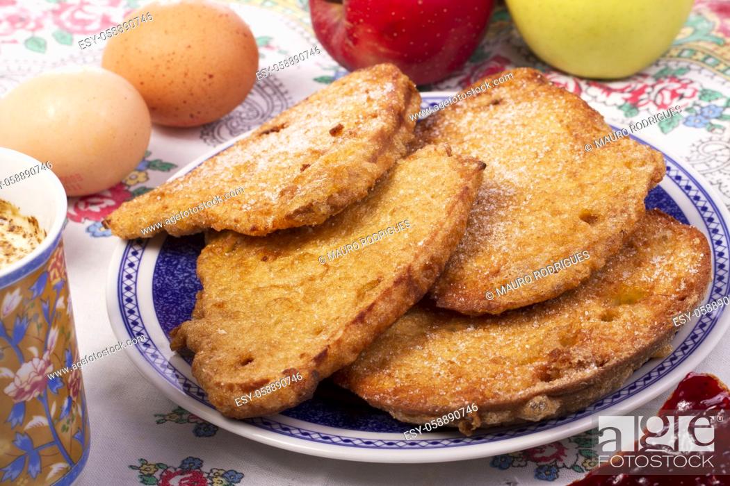 Stock Photo: Close up view detail of several golden slices of bread sprinkled with sugar.