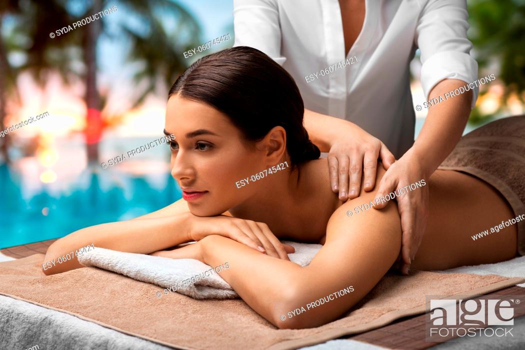Stock Photo: woman lying and having back massage at spa.