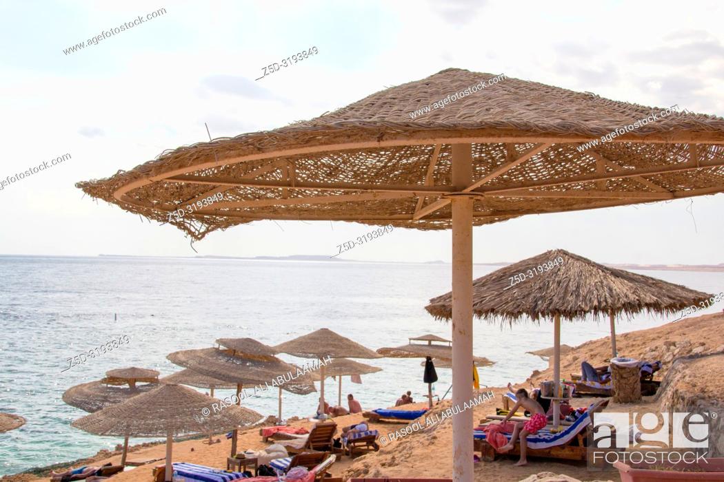 Stock Photo: Sharm El-Shaikh, Egypt - November 2, 2018:- photo for Red Sea coast In the Egyptian city of Sharm el-Sheikh, which showing water and some rocks and beds and.