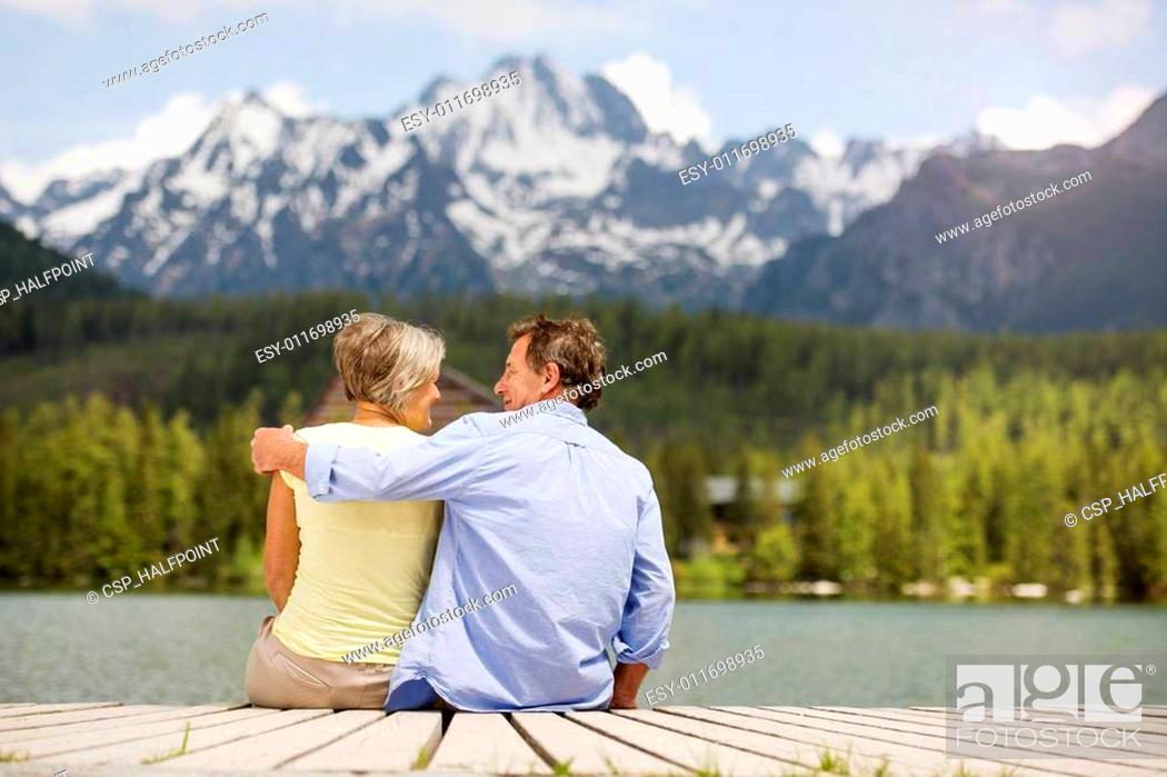 Stock Photo: Senior couple on pier.