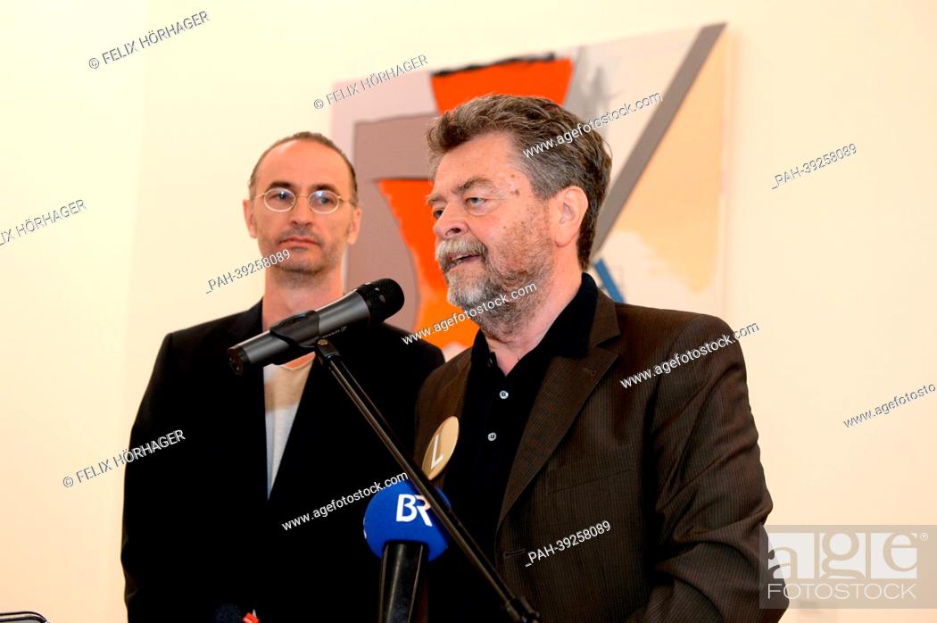 Stock Photo: Ulrich Hamann, architect at Foster und Partner (L), and Helmut Friedel, Director of the new Lenbachhausm speak at the new Lenbachhaus in Munich, Germany.