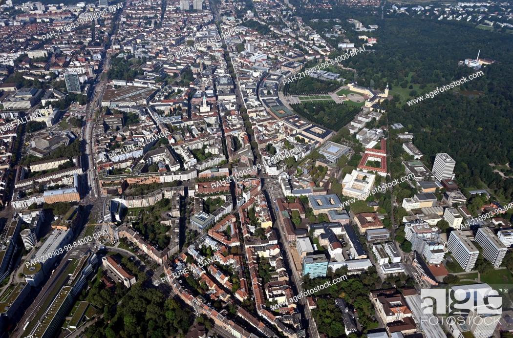 Stock Photo: 01 September 2021, Baden-Wuerttemberg, Karlsruhe: Aerial view (taken from an airplane) of downtown Karlsruhe with the Karlsruhe Castle.