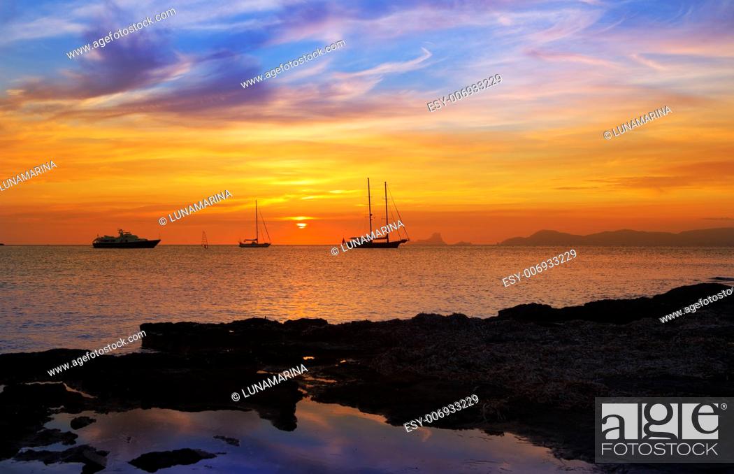 Stock Photo: colorful sunset of Ibiza view from formentera with Es Vedra.