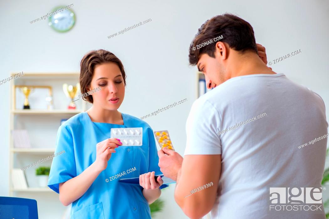 Stock Photo: Patient visiting doctor for annual regular check-up in hospital clinic.