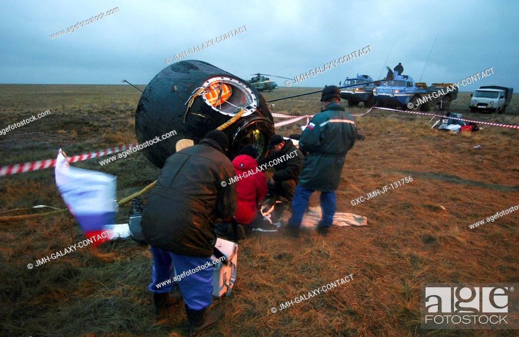 Stock Photo: The Soyuz capsule lies on its side after landing approximately 85 kilometers northeast of Arkalyk in northern Kazakhstan with astronaut Edward M.
