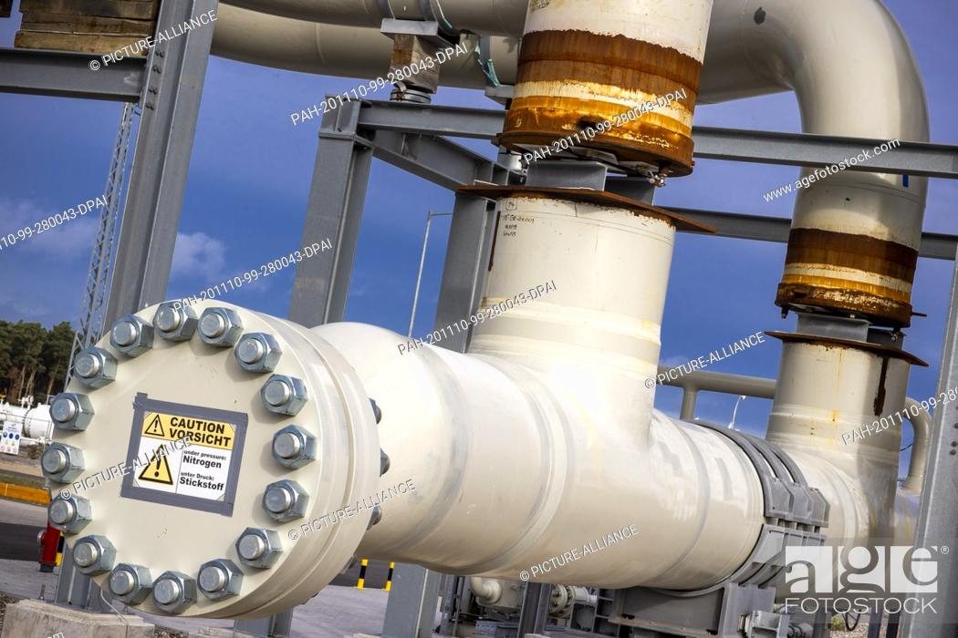 Stock Photo: 05 November 2020, Mecklenburg-Western Pomerania, Lubmin: Piping systems and shut-off valves are installed at the gas receiving station of the Nord Stream Baltic.
