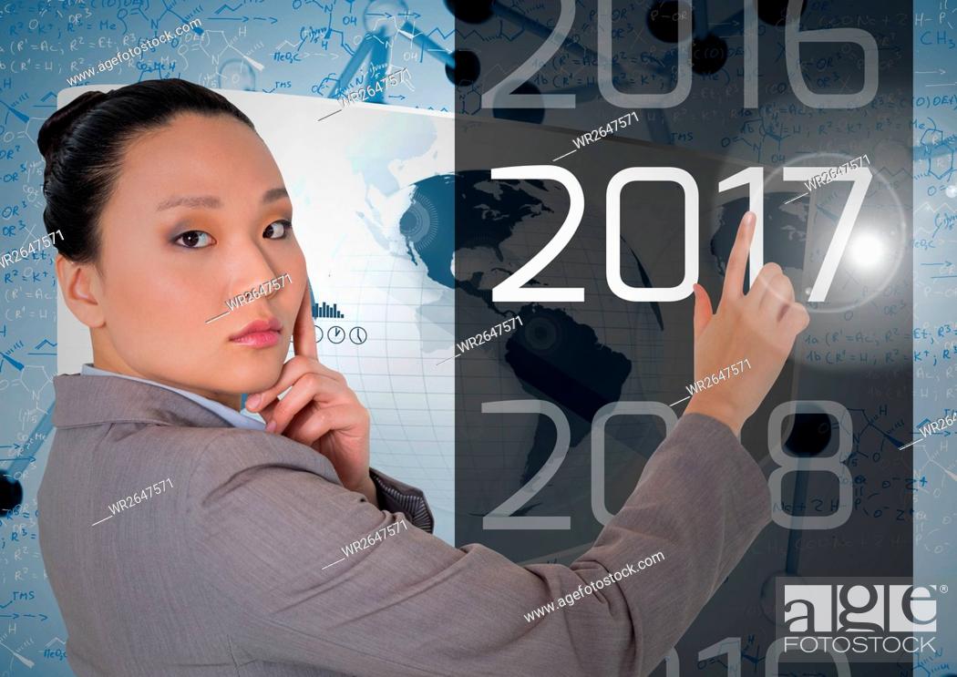 Stock Photo: Thoughtful business woman touching 2017 in 3D digitally generated background.