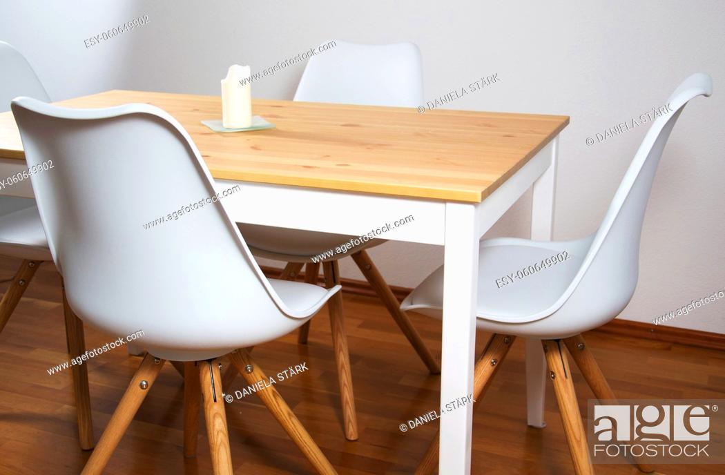 Stock Photo: dining table with white chairs.