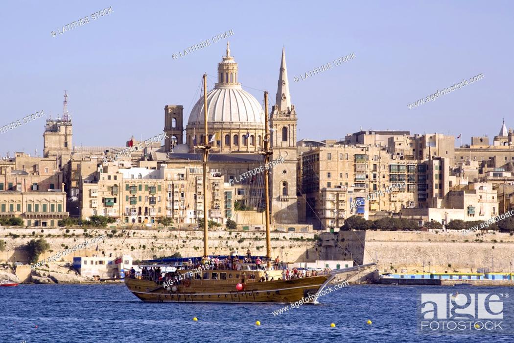 Stock Photo: Valletta is the capital city of Malta and is mostly built in the Baroque architectural style. The dome of the Carmelite Church is a prominent landmark.