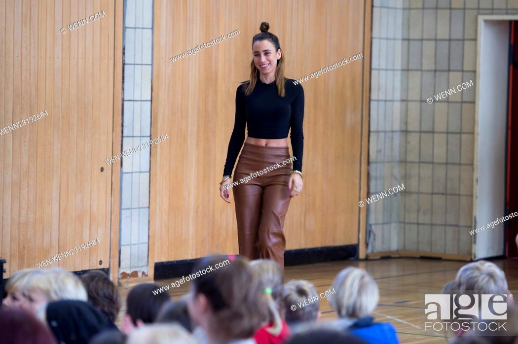 Photo de stock: Medina talks to kids at the Scandinavian school. After a Q&A she performs some songs at the school's gym. Featuring: Medina Where: Berlin.