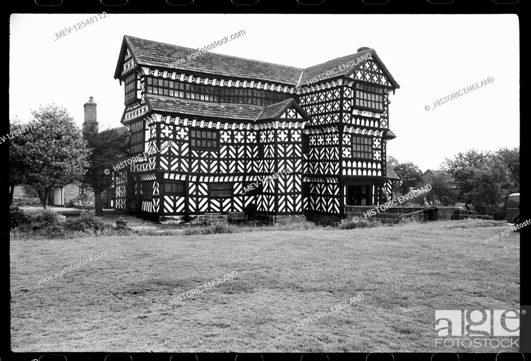 Stock Photo: Exterior view of Little Moreton Hall taken from the south-west. At the far right side is the three-storeyed gabled porch that reaches the single-span ashlar.