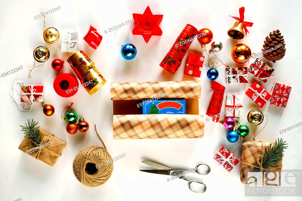 Stock Photo: Christmas gifts and decorations. The concept: preparation for the New Year and Christmas, wrapping gifts.