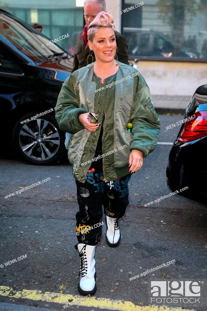 Stock Photo: Singer Pink visiting BBC Radio studios to promote her album 'Beautiful Trauma'. Pink saw a fan who had a massive portrait tattoo of her face and stopped by to.