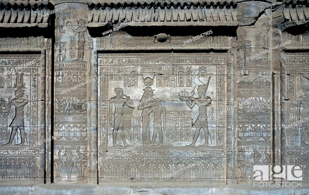 Stock Photo: Dendera Egypt, ptolemaic temple dedicated to the goddess Hathor. Carvings on external wall of the mammisi.