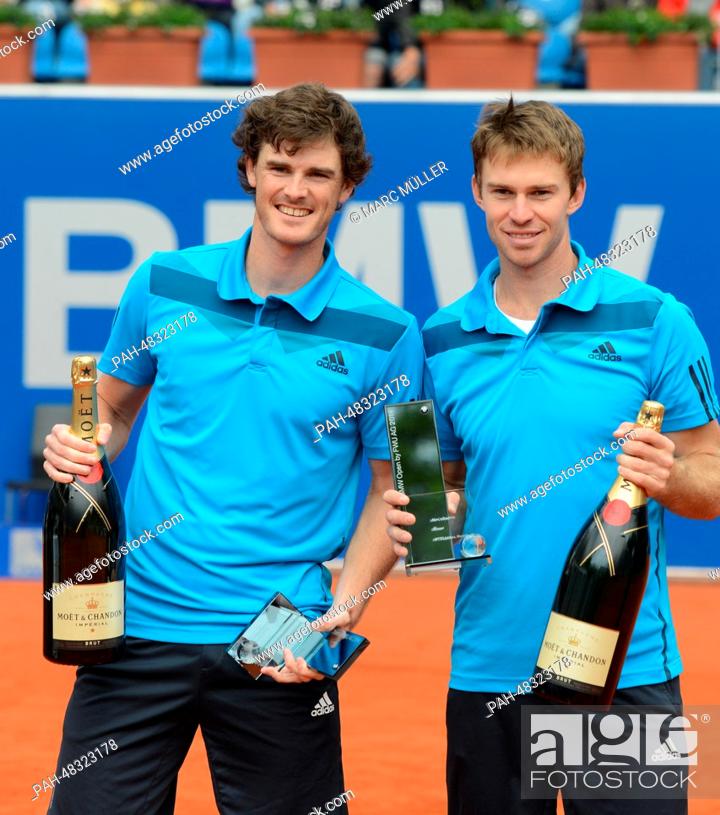 Stock Photo: Britain's Jamie Murray (L) and doubles partner Australia's John Peers hold their trophies after the final match against Britain's Fleming and Hutchins at the.