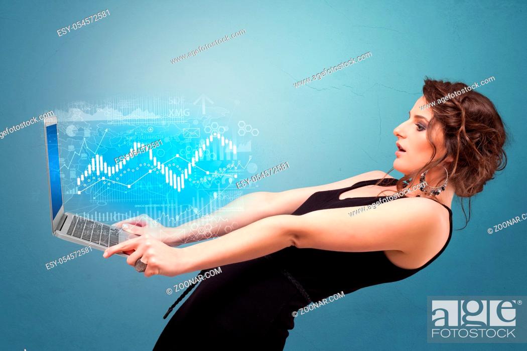 Stock Photo: Woman holding laptop projecting financial information, diagrams and charts.
