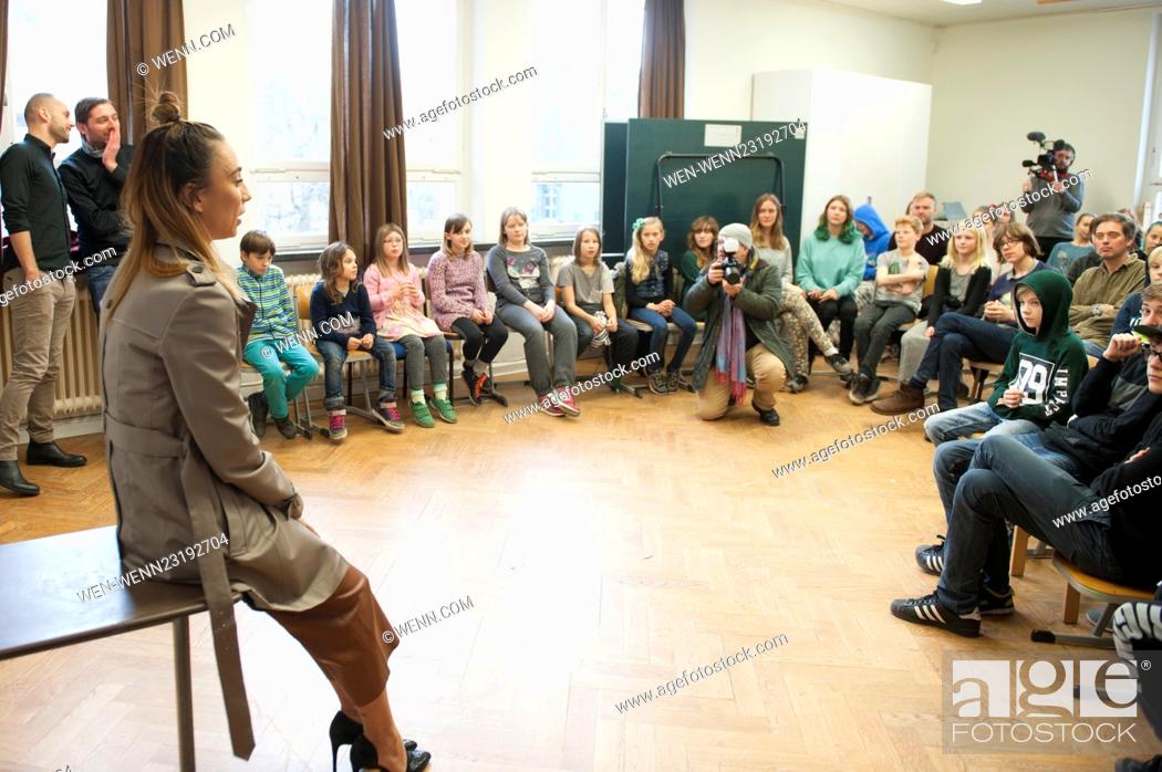 Stock Photo: Medina talks to kids at the Scandinavian school. After a Q&A she performs some songs at the school's gym. Featuring: Medina Where: Berlin.