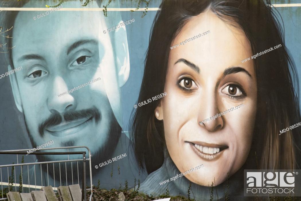 Stock Photo: The mural with the smiling faces of the two researchers Giulio Regeni and Valeria Solesin created by the artists Rosk & Loste in the Aldrovaldi Garden (now.