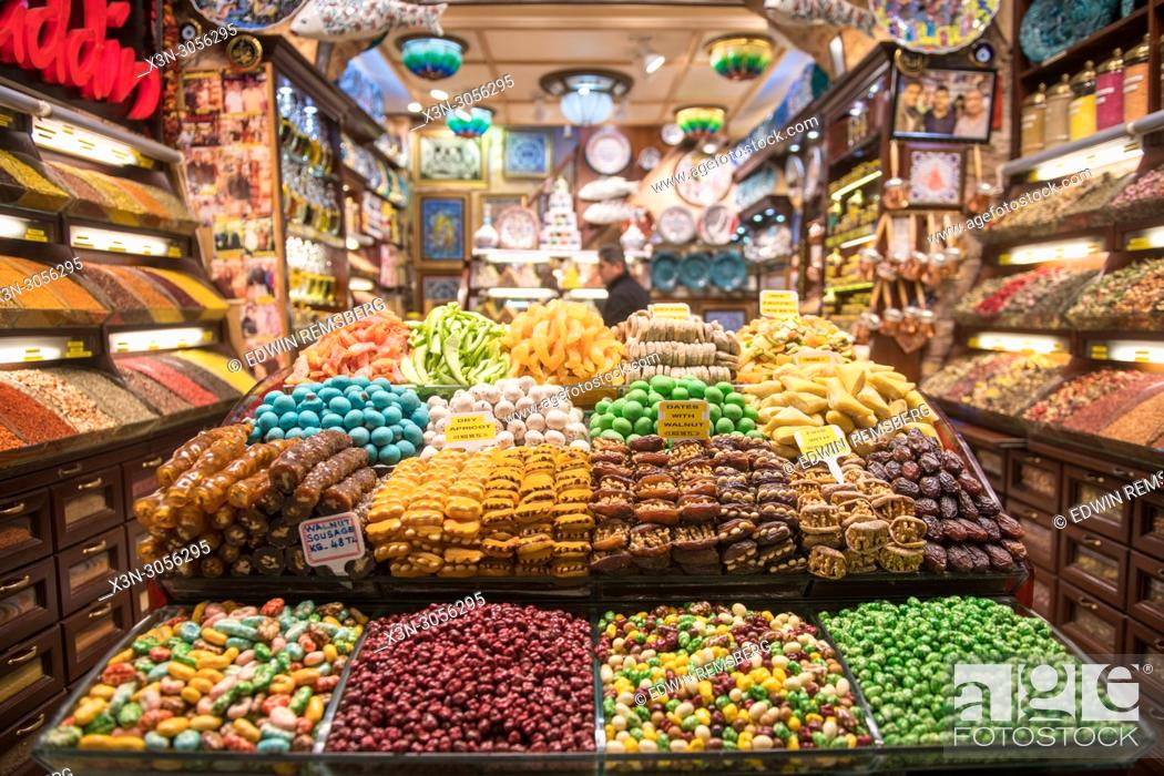 Stock Photo: Well ordered shelves of delicious candies and confections entice shoppers at storefront in Istanbul Spice bazaar in Turkey.