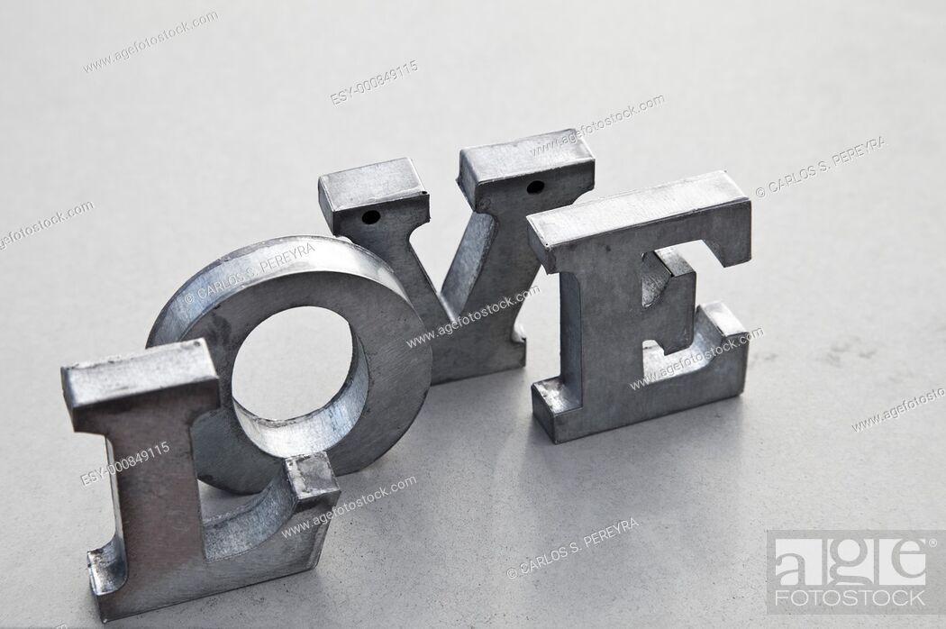 Stock Photo: message of love with metal letters.
