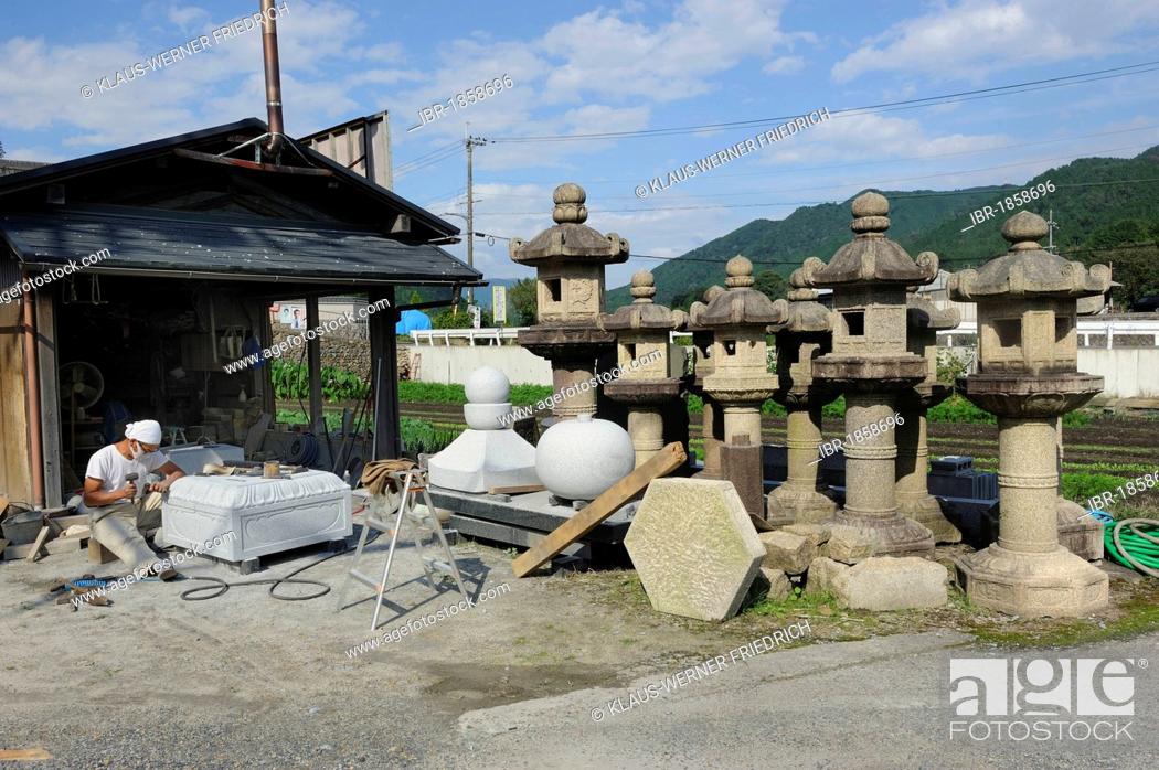 Stock Photo: Stonemason chiseling at the base of a stone lamp, Ohara near Kyoto, Japan, East Asia, Asia.