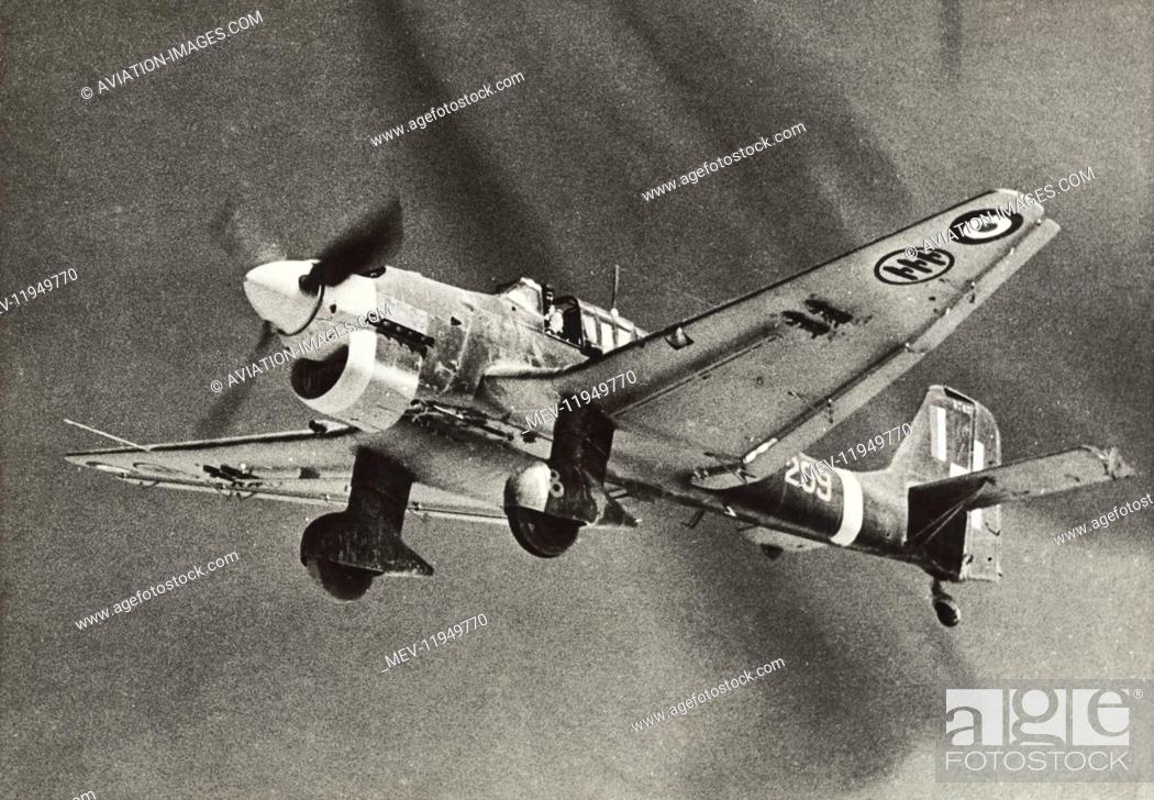 Stock Photo: Junkers Ju-87 Stuka with RAF and Italian Roundels Flying Again after Capture by the RAF Following a Fuel-Starvation Crash Landing in the North African Desert.