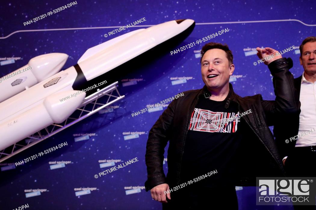 Stock Photo: 01 December 2020, Berlin: Elon Musk (l), head of the space company SpaceX and Tesla CEO, and Mathias Döpfner, CEO of Axel Springer SE.
