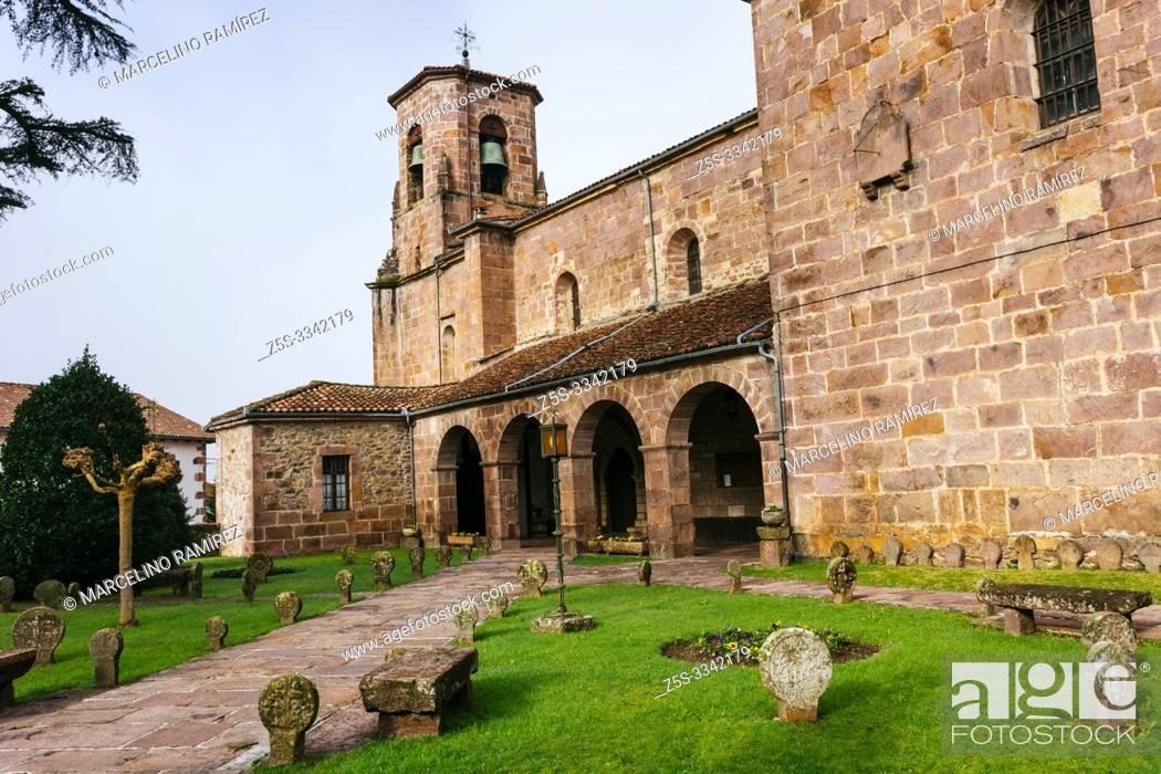 Stock Photo: Church of the Assumption. Around the church you can see the remains of an ancient cemetery with discoid steles cut from stone from the sixteenth century.