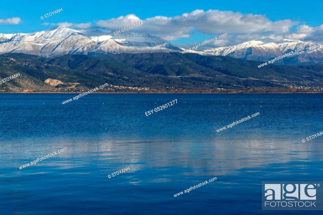 Stock Photo: Amazing winter Landscape of Lake Pamvotida and Pindus mountain from city of Ioannina, Epirus, Greece.