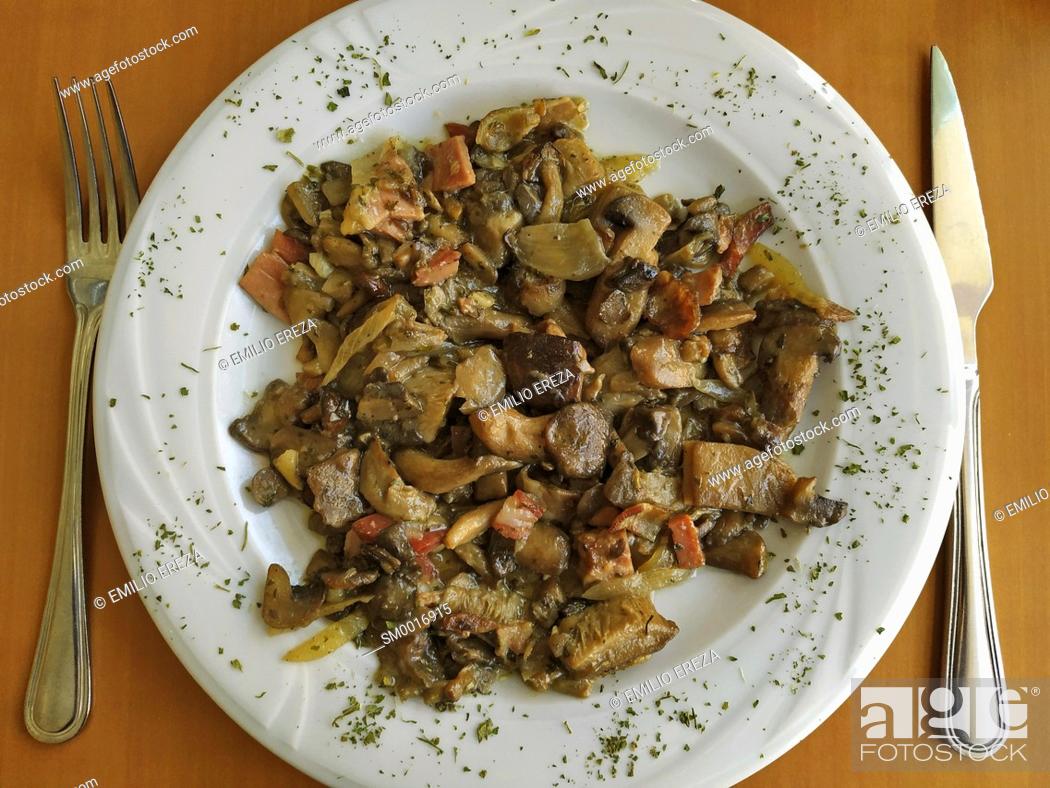 Imagen: Sauteed of mushrooms and bacon.