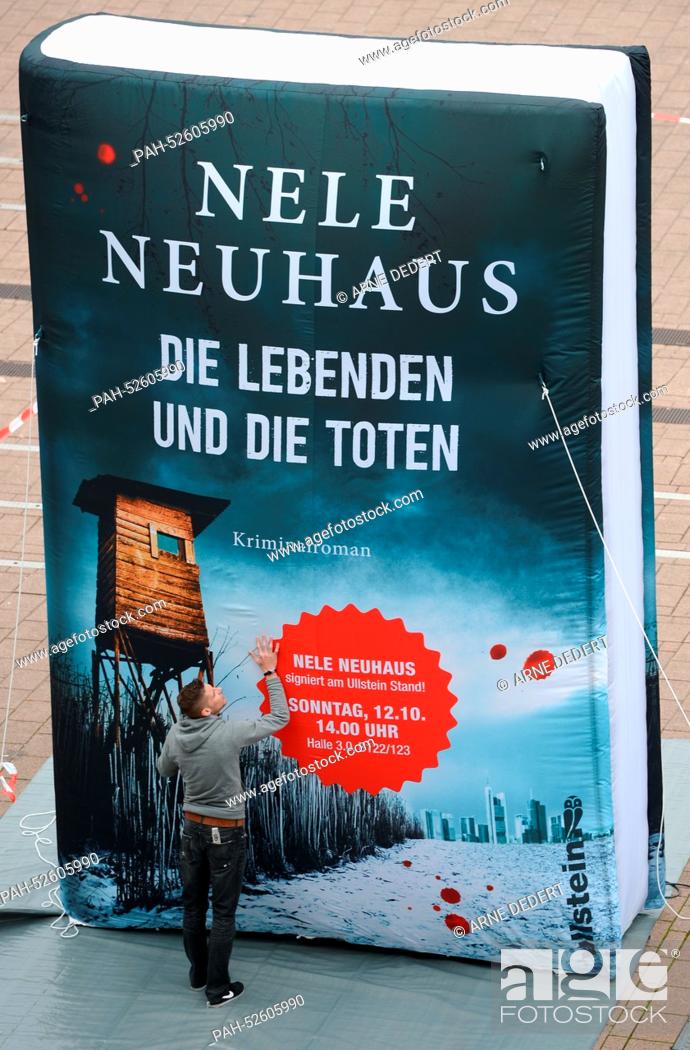 Stock Photo: A large, inflatable boob titled «Die Lebenden und die Toten» (engl.'The Alive and the Dead') from thriller author Nele Neuhaus is pictured at the book trade.