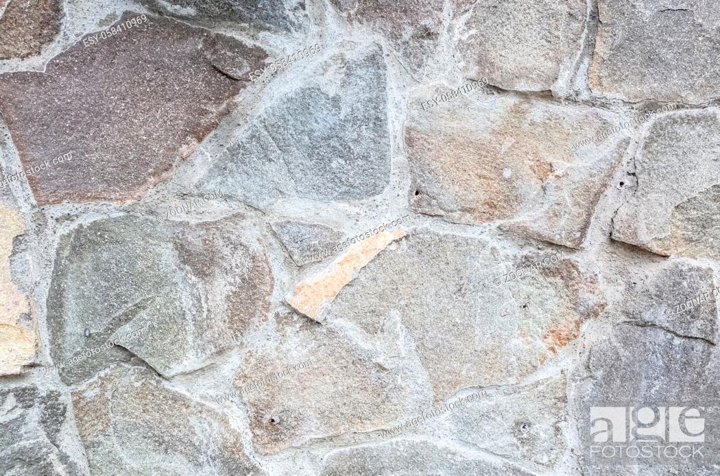 Stock Photo: rough rock wall background with good detail.