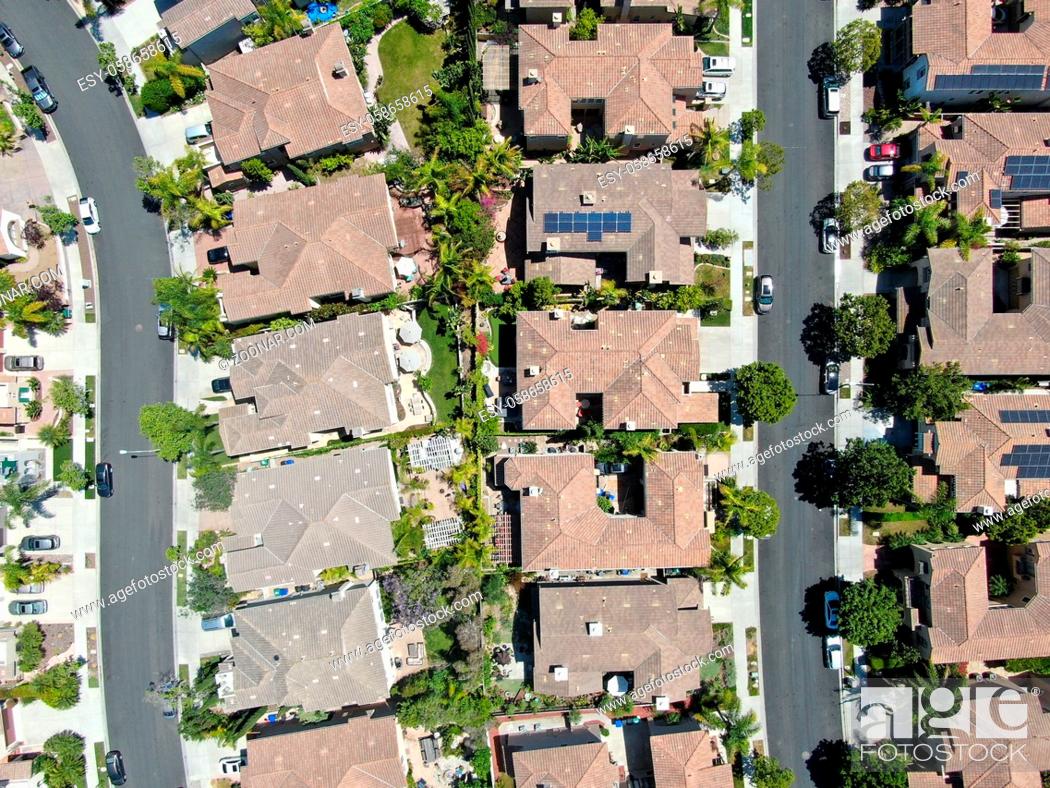 Stock Photo: Aerial view of upper middle class neighborhood with residential houses in green valley, South California, USA.