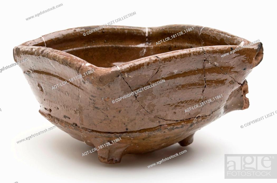 Stock Photo: Pottery test on three legs, round side wall and square top edge, fire test test stain soil find ceramic earthenware glaze lead glaze.