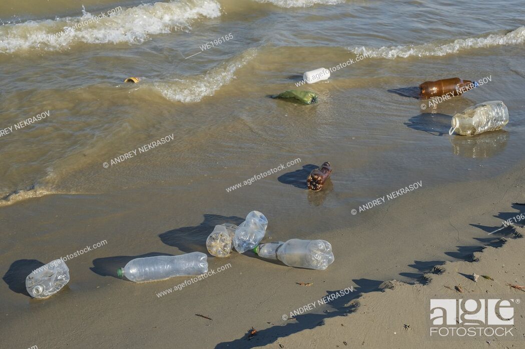 Stock Photo: DANUBE DELTA, VYLKOVE, ODESSA OBLAST, UKRAINE - JULY 11-15, 2020: Plastic pollution in Danube Biosphere Reserve. Plastic and other garbage from all over Europe.