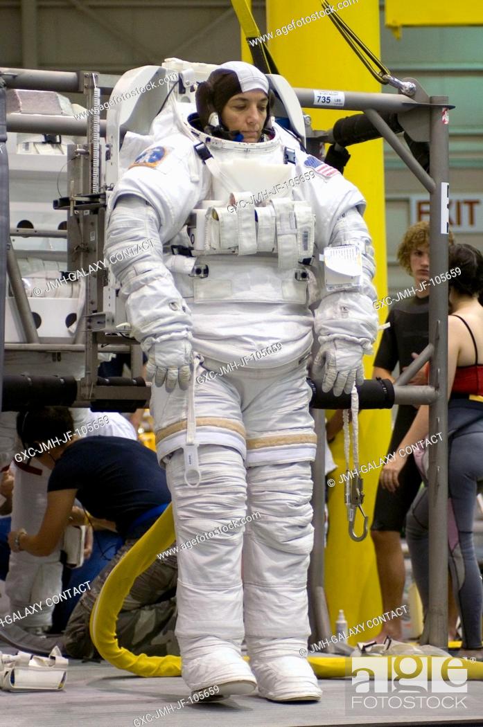 Stock Photo: Astronaut Heidemarie M. Stefanyshyn-Piper, STS-115 mission specialist, attired in a training version of the Extravehicular Mobility Unit (EMU) space suit.