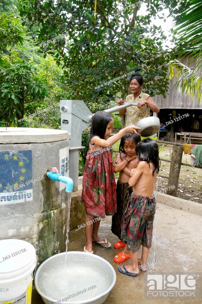 Girls bath cambodia stock photo taking a 