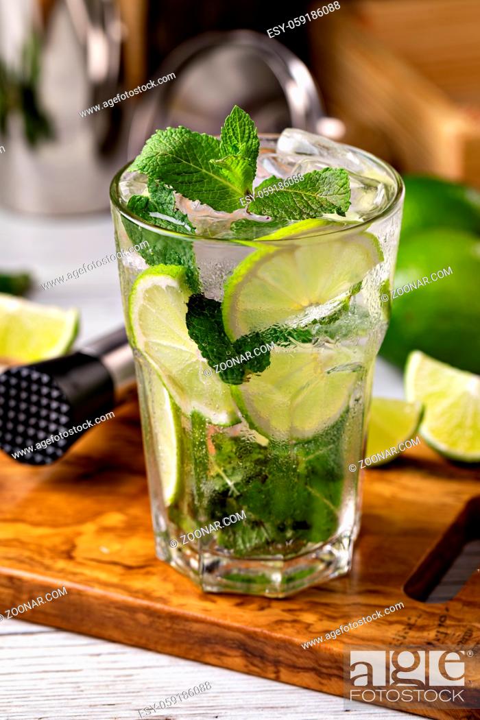 Stock Photo: Fresh Mojito cocktail with lime, mint and ice.