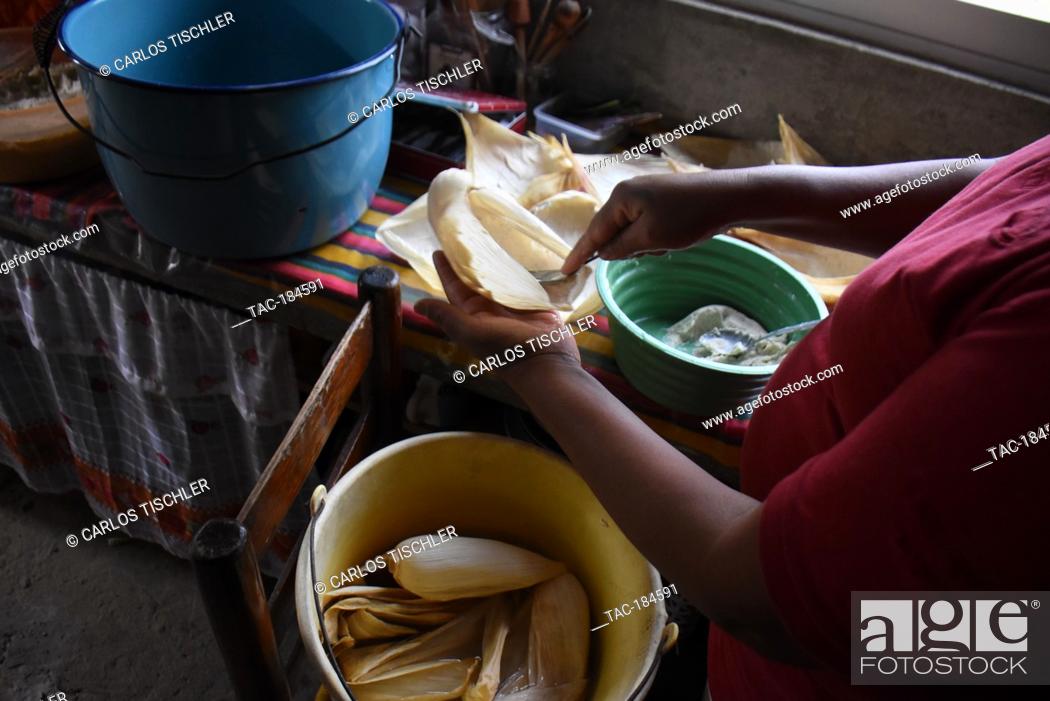 Stock Photo: TEPOZTLAN, MEXICO - JANUARY 16: The Housewife Isabel prepares 'Tamales' traditional Mexican food who are cooked in this season to celebrate the candlemas day.