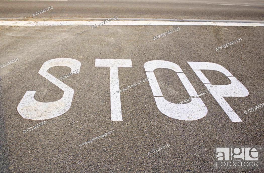 Stock Photo: Stop sign painted on the road, traffic ban.