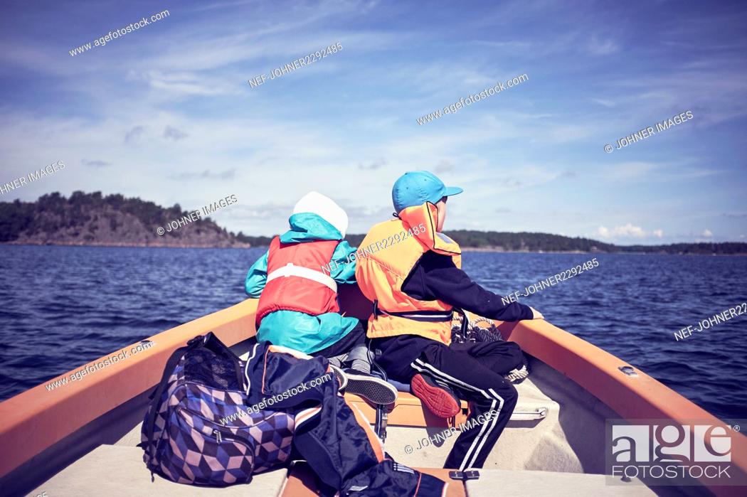 Stock Photo: Two boys on boat.