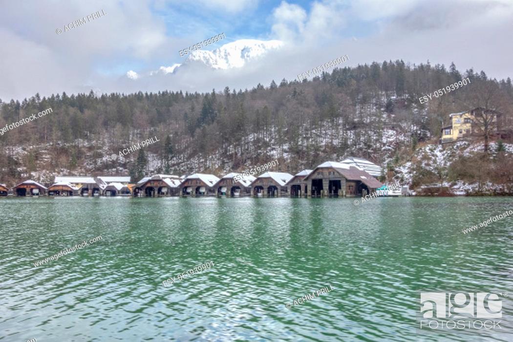 Stock Photo: Scenery including lots of boathouses at Schoenau am Koenigssee in Bavaria at winter time.