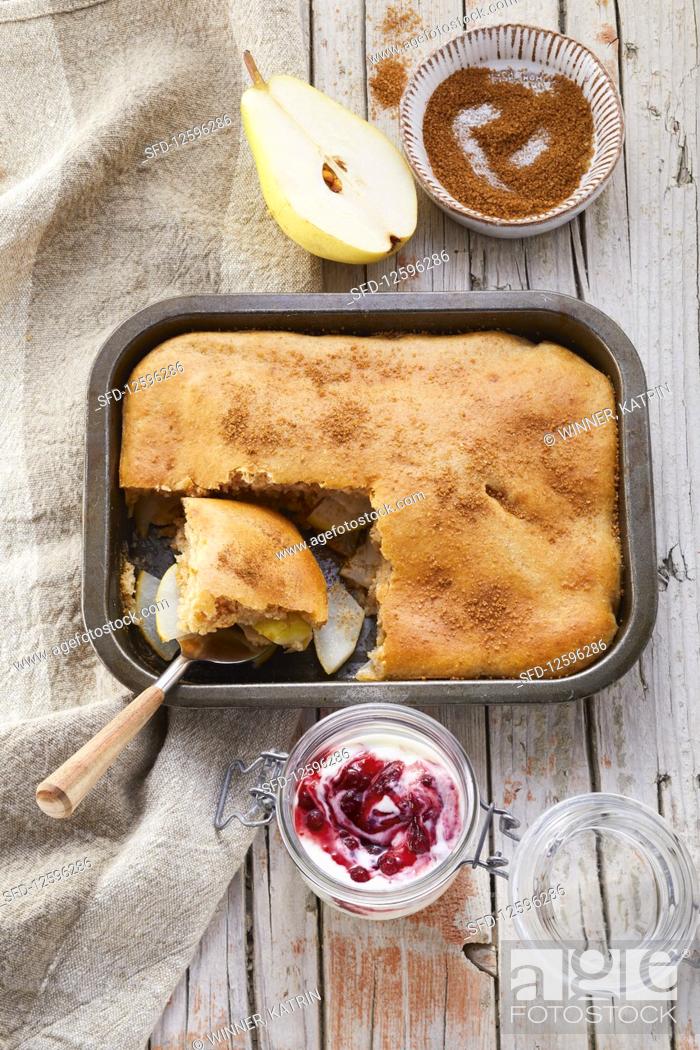 Stock Photo: Pear and cinnamon bake with cranberry and yoghurt.