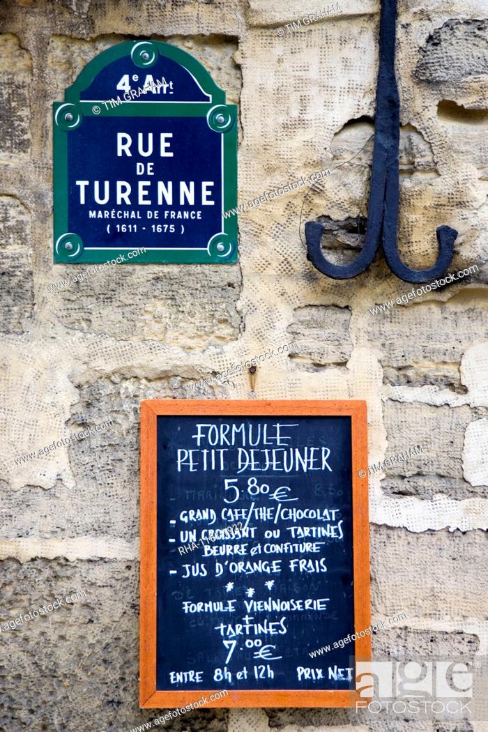 Stock Photo: Street sign and Petit Dejeuner brasserie board, rue de Turenne, 4th arondissement, Paris, France.