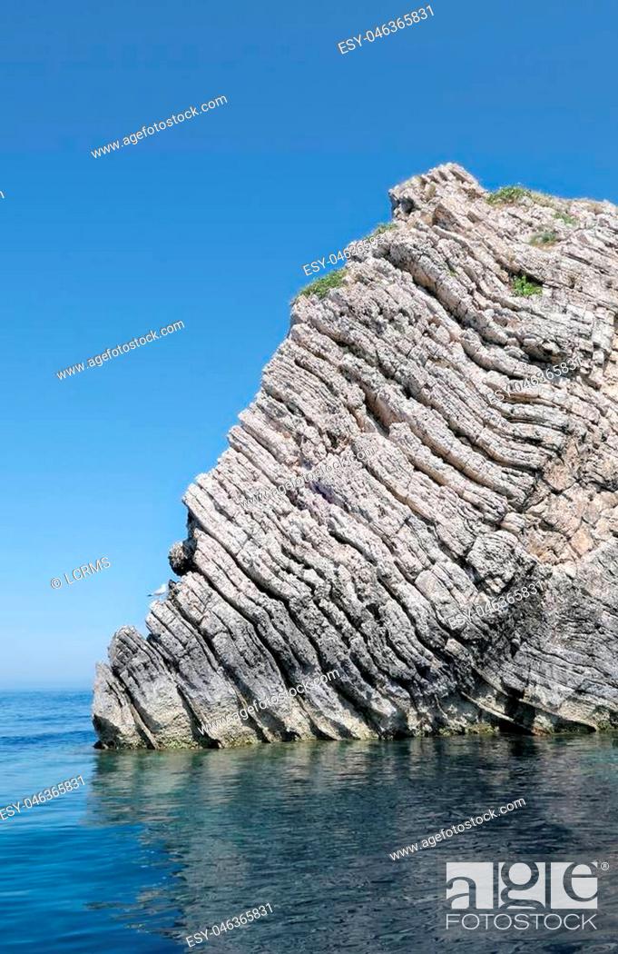 Stock Photo: paradise beach of Liapades at Corfu Island (Greece). Sedimentary rock cliff of chalk rocks.