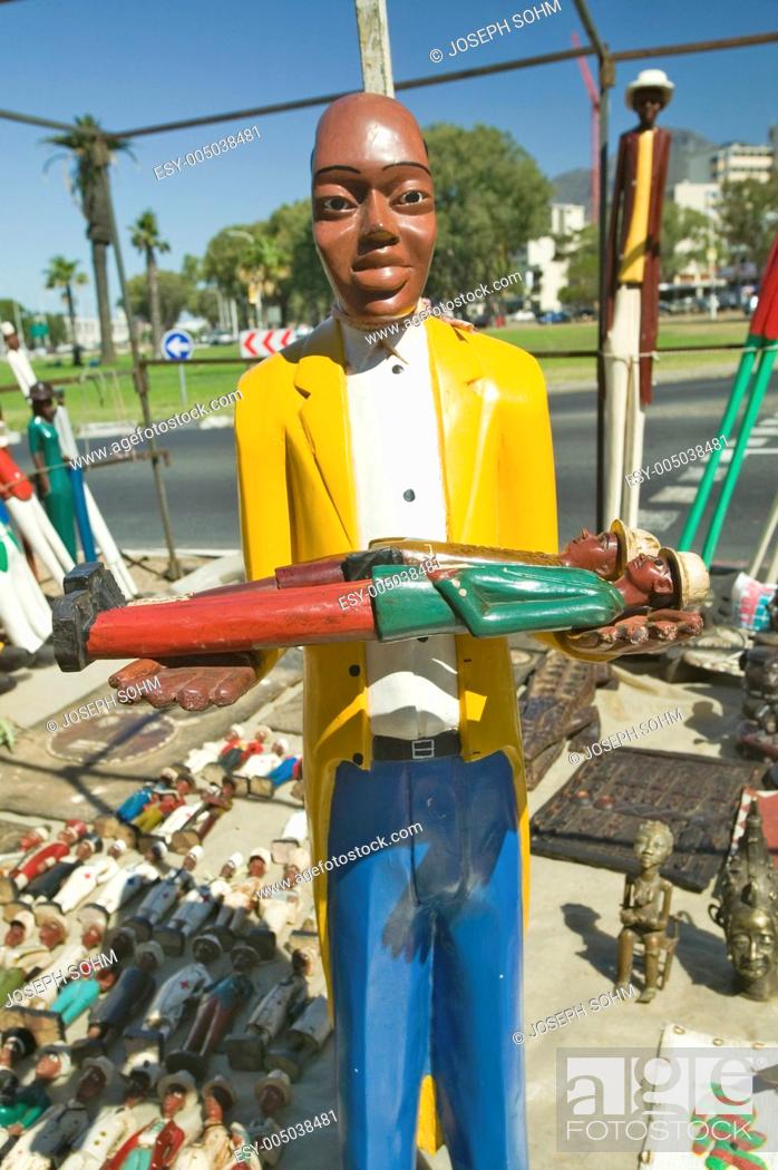 Photo de stock: Brightly colored wooden Colonial Dolls in Cape Town, South Africa.