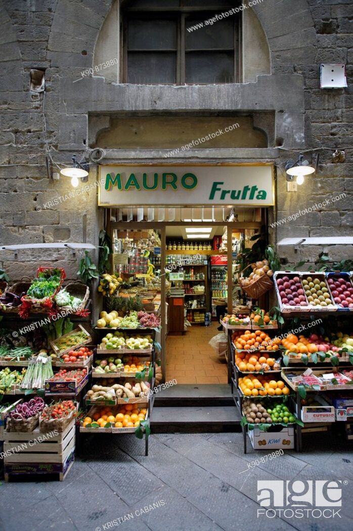Stock Photo: Traditional grocery store selling fruit and vegetable seen from front in a side street of the heart of Florence (Firenze), Tuscany, Italy, Southern Europe.