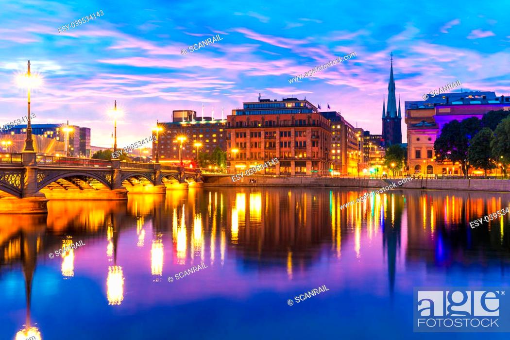 Stock Photo: Beautiful summer evening scenery of sunset in the Old Town (Gamla Stan) architecture near the Vasa Bridge (Vasabron) in Stockholm, Sweden.